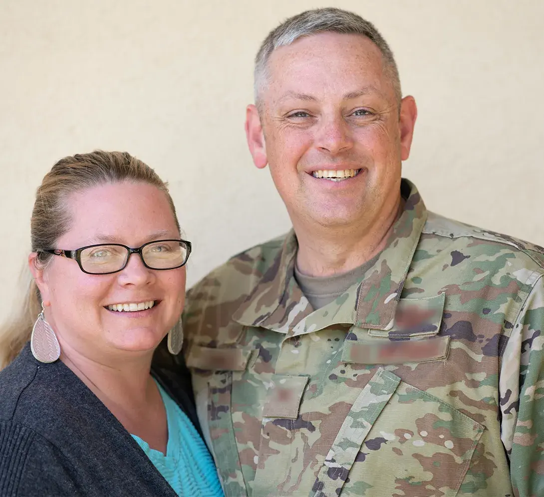 Two people posing for a picture.