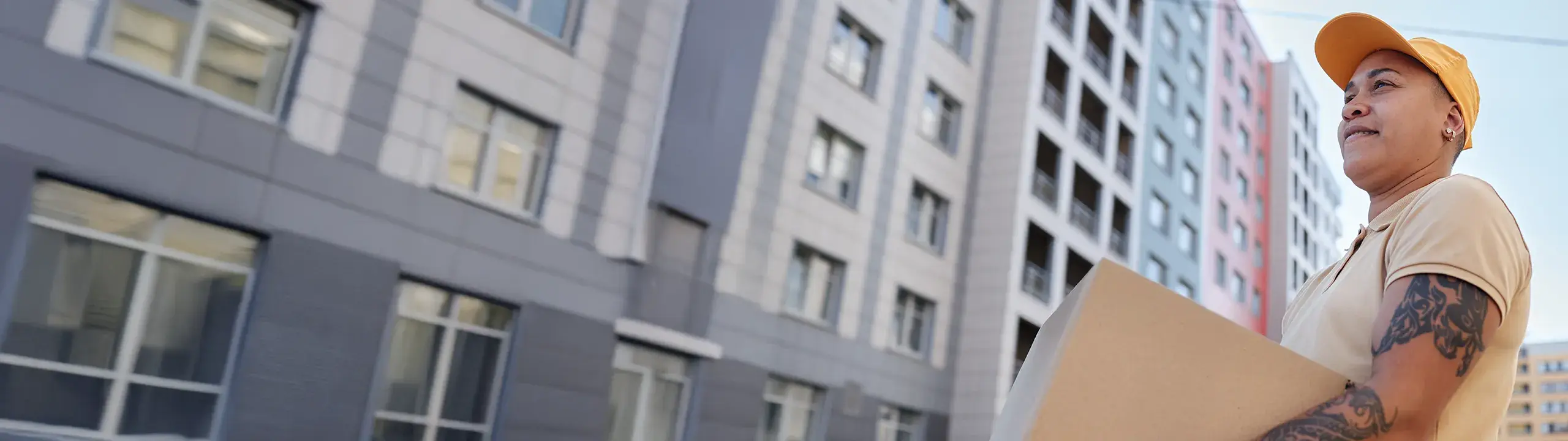 Image of someone carrying a box.