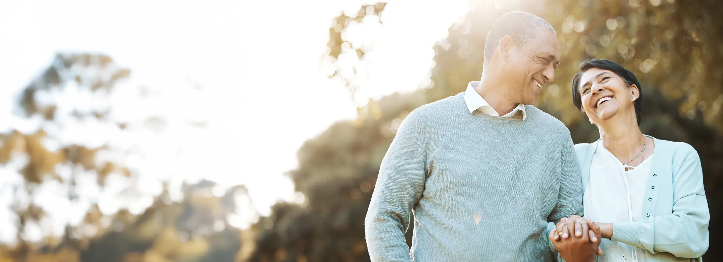 Two people holding hands.