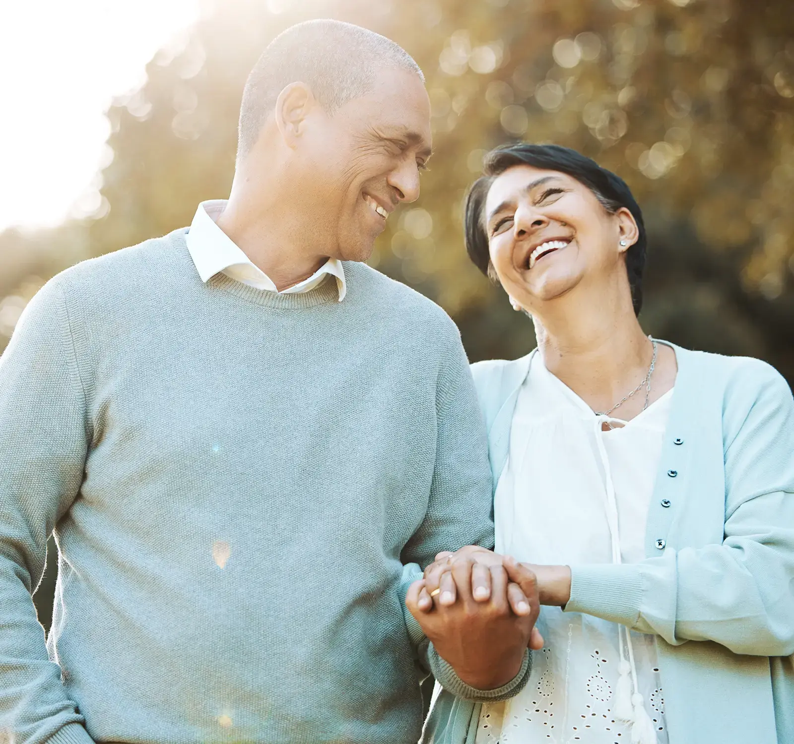 Two people holding hands.