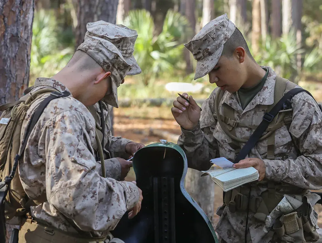 Three military personnel.