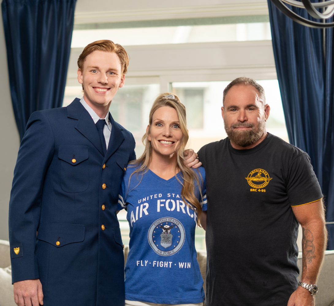 Three people standing in a line with various military attire and apparel.