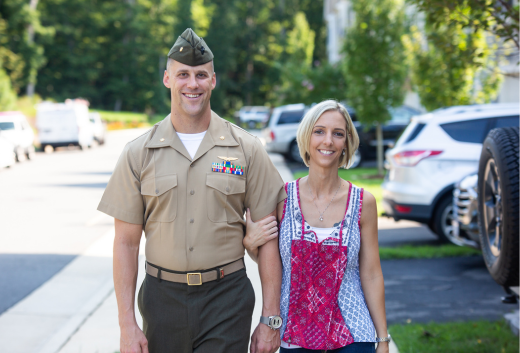 Military couple walking together