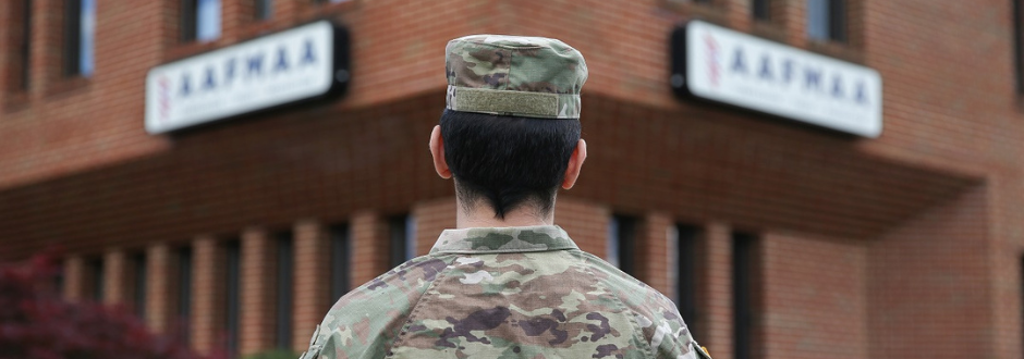 Servicemember facing away from camera