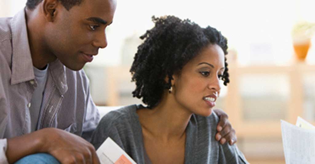 Couple looking at papers